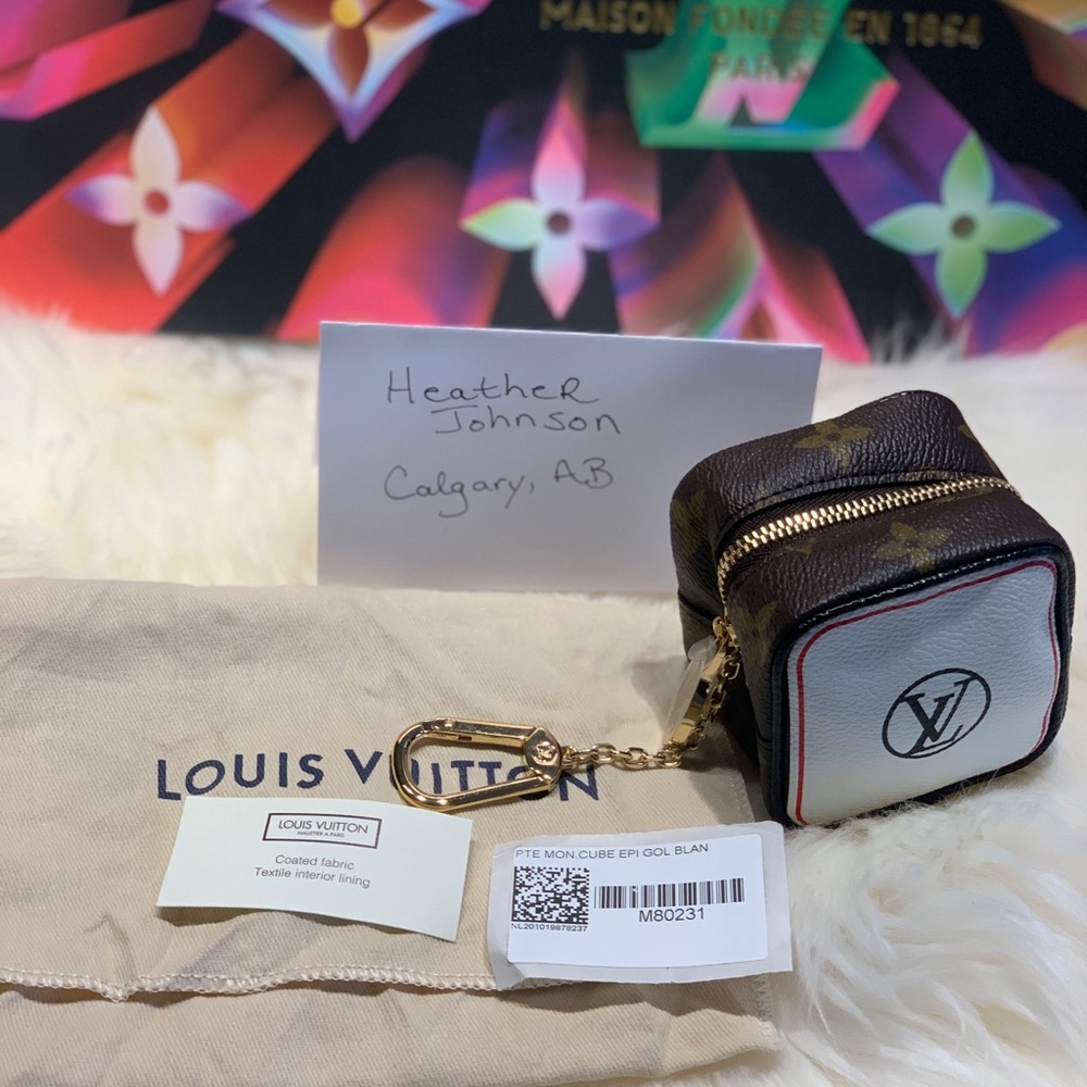 GAME ON CUBE COIN PURSE Louis vuttion